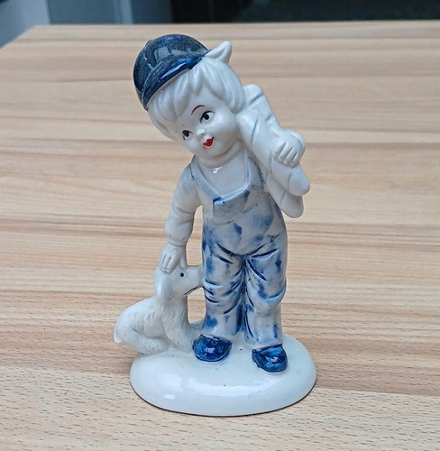 Porzellanfigur junge mit hund - porzellanfigur,
